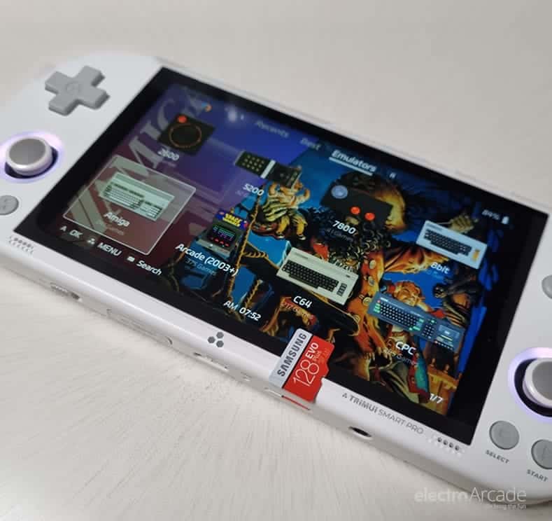 Trimui Smart Pro Crossmix Custom OS setup -upgrade card 1 Handheld gaming console displaying Crossmix OS setup with custom upgrade card.
